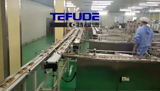 Línea de producción de envasado de alimentos Tefude Sistema de envasado automático de donuts/wafter/galletas/pasteles con servicio en el extranjero